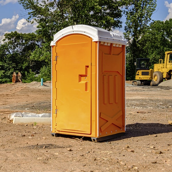 how often are the portable restrooms cleaned and serviced during a rental period in Atomic City